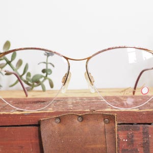 Vintage Sunglasses 1970&#39;s By Tura New Old Stock Made In Japan Color Splash Multi Color Frame Very Lightly Tinted Lens Wire rim