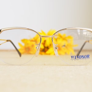 Vintage Eyeglasses 1980s/Glasses/New Old Stock/hipster By Windsor Made in Japan Gold tone with white and black enamel rimless