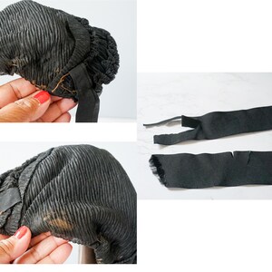 May include: A black fabric hat with a ruffled edge and a black ribbon. The hat is slightly worn and has a few brown stains. Two black fabric ribbons are also shown.