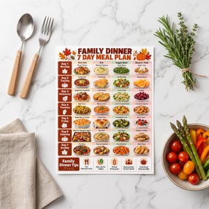May include: A printed 7-day family dinner meal plan chart featuring a grid of daily food items, autumn leaf illustrations, and a pumpkin graphic. The document includes columns for main dishes, sides, and veggies, plus a section for family dinner tips.