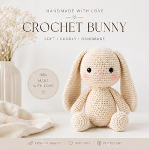 May include: A cream-colored crochet bunny toy with long ears, black plastic eyes, and pink stitched cheeks. The image includes text reading HANDMADE WITH LOVE, CROCHET BUNNY, SOFT, CUDDLY, HANDMADE, MADE WITH LOVE, PREMIUM QUALITY, BABY SAFE, and PERFECT GIFT.