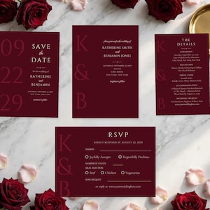 Puede incluir: Un conjunto de cuatro tarjetas de papetería de boda en color burdeos profundo con tipografía serif blanca, que incluye un Save the Date, invitación, tarjeta de detalles y tarjeta RSVP, mostrando las iniciales K y B en vertical.