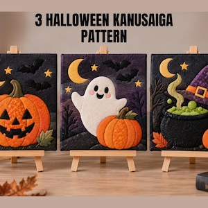 May include: Three square fabric wall art pieces on wooden easels featuring a 3 HALLOWEEN KANUSAIGA PATTERN. The designs include a jack-o'-lantern, a white ghost with a pumpkin, and a black cauldron with a witch hat, all set against dark backgrounds.