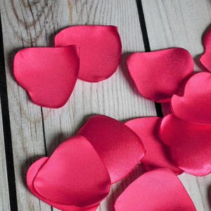 Heart shaped cherry colored satin rose petals, artificial hot pink flower petals