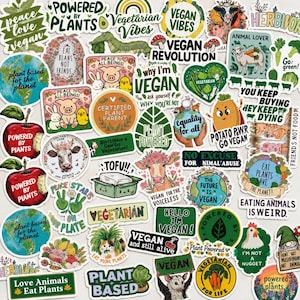 May include: A collection of assorted vinyl stickers featuring various plant-based, vegan, and animal rights themes. The stickers display colourful illustrations of animals, vegetables, and earth motifs, accompanied by text slogans like Vegan Vibes, Plant Powered, and Eat Plants Save The Planet.