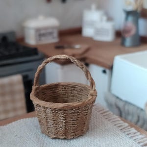 1:12 scale wicker baskets for dollhouses.