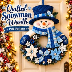 May include: A quilted snowman wreath featuring a blue top hat, a blue and white checkered scarf, and blue mittens. The wreath is decorated with white and blue fabric poinsettia flowers, pinecones, and snowflakes. Text reads Quilted Snowman Wreath PDF Pattern.