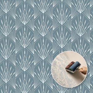 May include: A blue wallpaper pattern featuring white geometric fan-like lines and dots. An inset circle shows a blue paint roller applying a fern leaf pattern to a light surface, demonstrating the application process for this wall covering.
