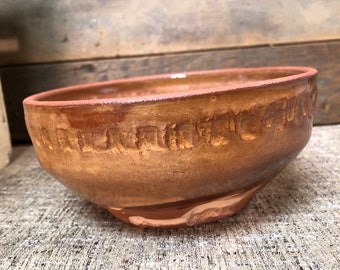 Handmade pottery bowl, coggled design