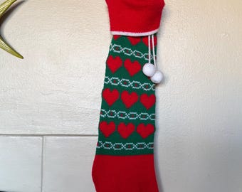 Vintage Christmas stocking red green hearts holiday gifts knit sock Santa Claus December party decoration white tassel winter family snow