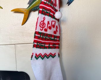 Vintage Christmas stocking red green hearts holiday gifts knit sock Santa Claus December party decoration white tassel winter family snow