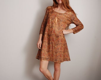 60s small paisley print gold psychedelic short mini holiday party empire waist long sleeve dress womens vintage clothing