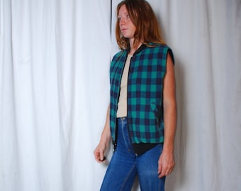 80s Dickies medium flannel puffy vest buffalo plaid green black zip up pockets lumberjack woods camping mens vintage clothing workwear hip