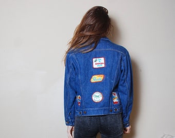 80s small Wrangler denim jacket with ladies motorcycle patches Honda Nut classic blue jean metal cowboy light weight punk rocker womens boho