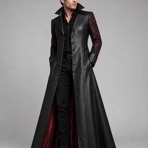 May include: A long black coat featuring a high collar, a front button closure, and dark red patterned sleeves. The coat is worn over a black button-down shirt and black trousers, with a deep red lining visible along the interior hemline.