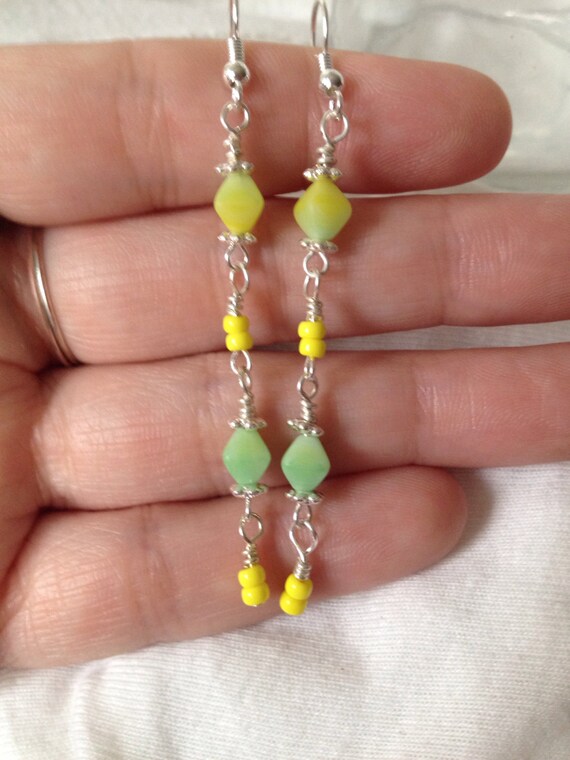 Items similar to Lemon lime long dangly earrings on Etsy