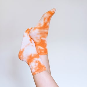 Orange tie-dyed socks image 1