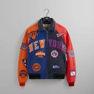 Kith x Avirex x New York Knicks Leather Varsity Jacket – Multicolor Patchwork Design