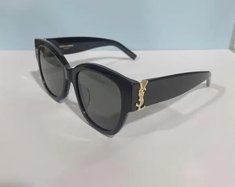 Gafas de sol Saint Laurent SL M95/F 001 negras con lentes gris oscuro y detalles dorados. AUTÉNTICAS.
