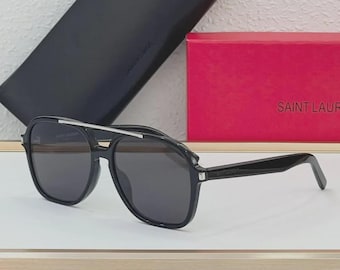 Gafas de sol unisex Saint Laurent SL545: Estilo aviador negro 57-18-145