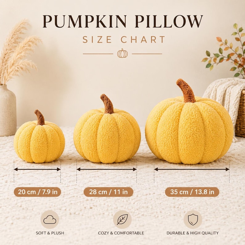 May include: A size chart for a pumpkin pillow featuring three yellow, textured, plush pumpkin-shaped pillows with brown stems. The sizes are labeled as 7.9 inches, 11 inches, and 13.8 inches. The text reads PUMPKIN PILLOW SIZE CHART, SOFT & PLUSH, COZY & COMFORTABLE, DURABLE & HIGH QUALITY.