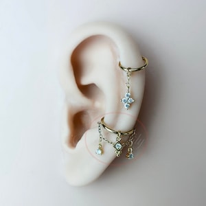 Implant Grade Titanium White CZ Marquise Gem With Chain Helix Hinged Clicker Hoop Implant Grade Titanium White CZ Marquise Gem With Chain Helix Hinged Clicker Hoop