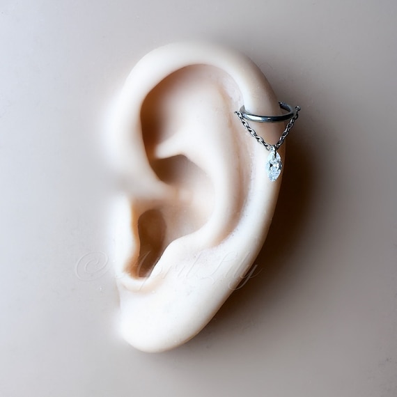 Implant Grade Titanium White CZ Marquise Gem With Chain Helix Hinged Clicker Hoop Implant Grade Titanium White CZ Marquise Gem With Chain Helix Hinged Clicker Hoop
