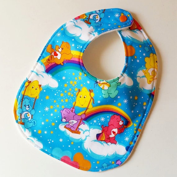 blue care bear with rainbow