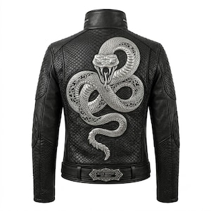 May include: A black jacket with a textured snakeskin pattern and a large, detailed silver-coloured snake emblem on the back. The jacket features a high collar, quilted elbow patches, and a belt at the waist with a plaque reading BLACK SERPENT EST. MMXVII.