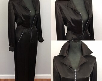 Vintage late 1960s early 1970s black palazzo jumpsuit catsuit by Mam’selle