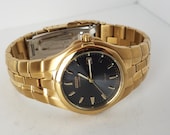 Elegant Citizen Eco-Drive Gold Watch Model E111-K005817