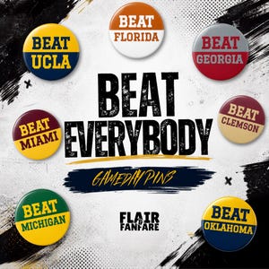 May include: Seven circular buttons with sports-themed text. The center reads BEAT EVERYBODY and GAMEDAY PINS. Individual buttons feature the text BEAT UCLA, BEAT FLORIDA, BEAT GEORGIA, BEAT MIAMI, BEAT CLEMSON, BEAT MICHIGAN, and BEAT OKLAHOMA in various colors.