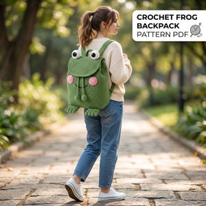 May include: A green crochet frog backpack with large white eyes, pink circular cheeks, and dangling pom-poms. The bag features a flap closure and frog feet at the base. Text in the upper right corner reads: CROCHET FROG BACKPACK PATTERN PDF.