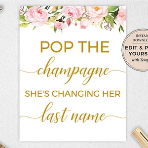 Könnte beinhalten: Ein druckbares Schild mit rosa Blumenillustrationen und goldenem Text, der "Pop the champagne she's changing her last name" lautet. Das Schild enthält auch den Text "Sofortiger Download Bearbeiten und selbst ausdrucken mit Templett".
