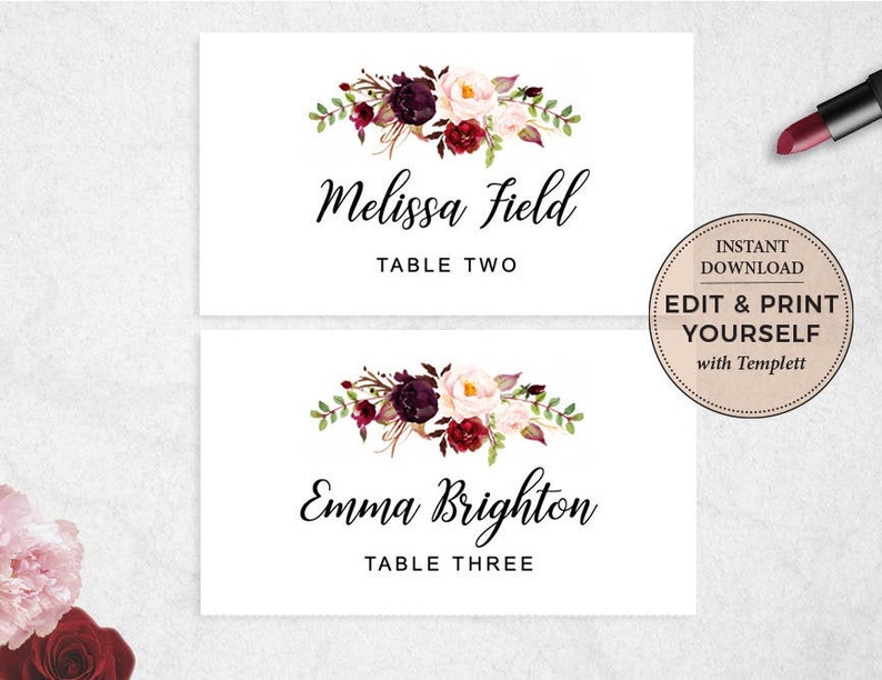 May include: Two printable place cards with floral designs in shades of burgundy, pink, and green. The text on the cards reads "Melissa Field, Table Two" and "Emma Brighton, Table Three".