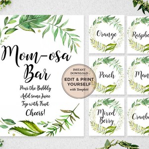 May include: A printable sign for a "Mom-osa Bar" with a green leafy border and gold accents. The sign says "Pour the bubbly, add some juice, top with fruit, cheers!" and includes instructions for editing and printing with Templett.
