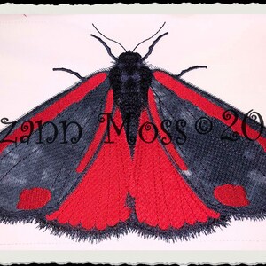 May include: Embroidered black and red moth with a fuzzy texture. The moth has red wings with black spots and a black body. The text "Suzanne Moss © 2020" is embroidered in black on the background.