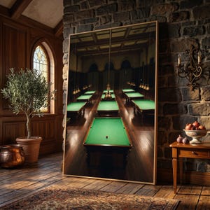 May include: A large rectangular framed wall art piece featuring a high-resolution photograph of a dimly lit billiard hall with multiple green felt pool tables arranged in rows under hanging pendant lights on a dark wooden floor.