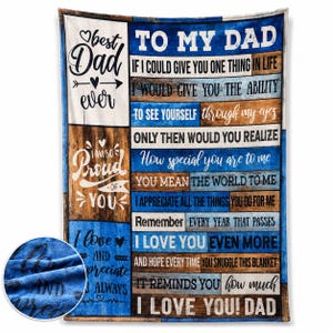 May include: A rectangular fleece blanket featuring a rustic wood-plank pattern in shades of blue and brown. The text reads: TO MY DAD, IF I COULD GIVE YOU ONE THING IN LIFE, I WOULD GIVE YOU THE ABILITY TO SEE YOURSELF THROUGH MY EYES.