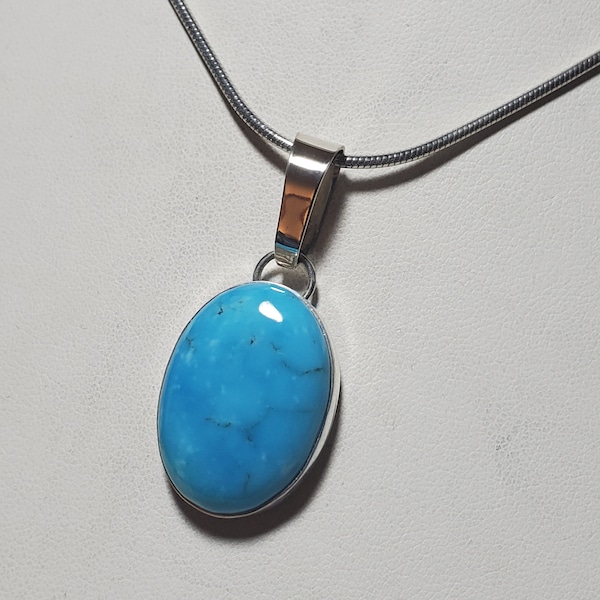 Turquoise. Kingman sky blue turquoise pendant.  Cut and polished by seller.  Genuine.  A top quality piece of turquoise in the pendant. Best