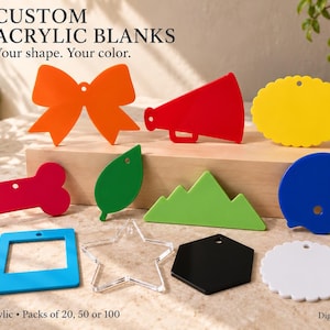 May include: Custom acrylic blanks in various shapes and colors, including a bow, megaphone, scalloped circle, bone, leaf, mountain, football helmet, square, star, hexagon, and circle. Text reads: CUSTOM ACRYLIC BLANKS. Your shape. Your color. 3 mm acrylic.