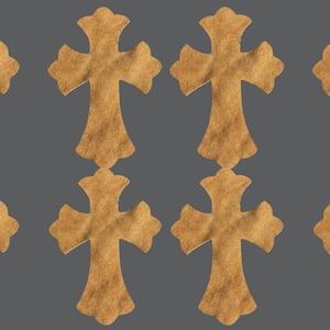May include: Eight identical tan-colored cross-shaped cutouts arranged in two rows of four. Each cross features a textured surface with flared ends and a rounded top, bottom, and side arms, presented against a solid dark gray background.