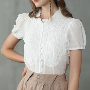 smocked linen blouse in white, puff-sleeve ruffled blouse, short sleeved blouse, victorian blouse, button-front linen shirt | Linennaive