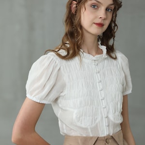 smocked linen blouse in white, puff-sleeve ruffled blouse, short sleeved blouse, victorian blouse, button-front linen shirt Linennaive image 8