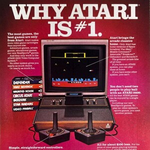 May include: An advertisement for the Atari 2600 video game console. The ad features the console, controllers, and game cartridges. The screen displays a game. Text reads "WHY ATARI IS #1" and highlights game features.
