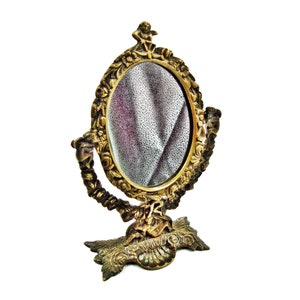 Antique ornate brass table mirror French budoir accessory
