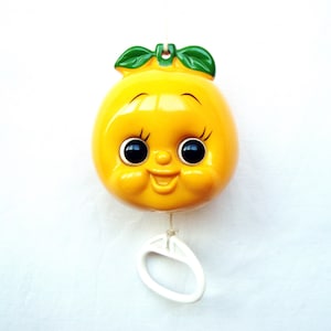 Vintage Baby musical toy Sankyo pull-string Musical apple  Made in Malaysia 1974