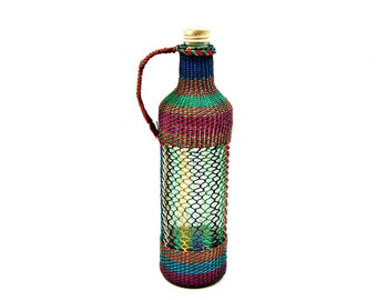 Vintage wrapped glass bottle Hand weaved with plastic threads Dame Jeanne