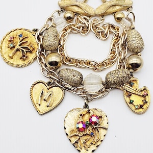 Vintage 1950s Breathtaking Coro Charm Bracelet with Large Heavy Ornate Charms Rhinestones Gold Tone Multi Strand Beads Statement Jewelry