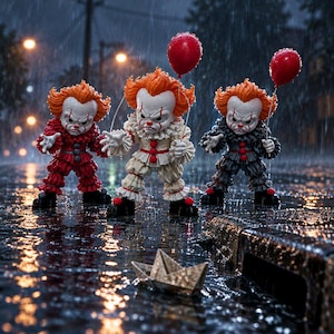 May include: Three stylized clown figurines with orange hair and white face paint, wearing ruffled outfits in red, white, and dark gray. Two figures hold red balloons, while a small paper boat rests on the wet ground in front of them.